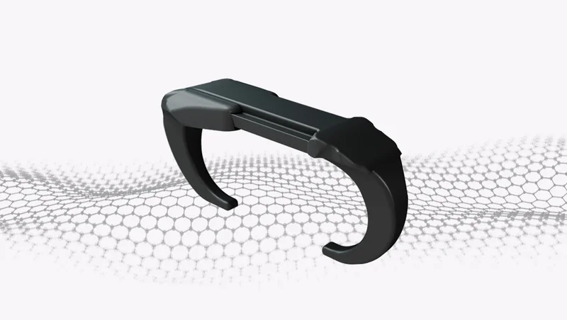Dispositivo STERN FIX, com estrutura escura e extremidades curvas
